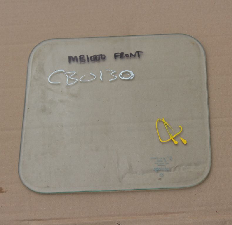 USED MB TRAC FRONT LOWER GLASS